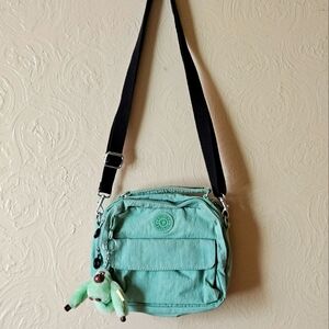 Kipling Canvas crossbody bag convertible bagpack ligth green mint color.
